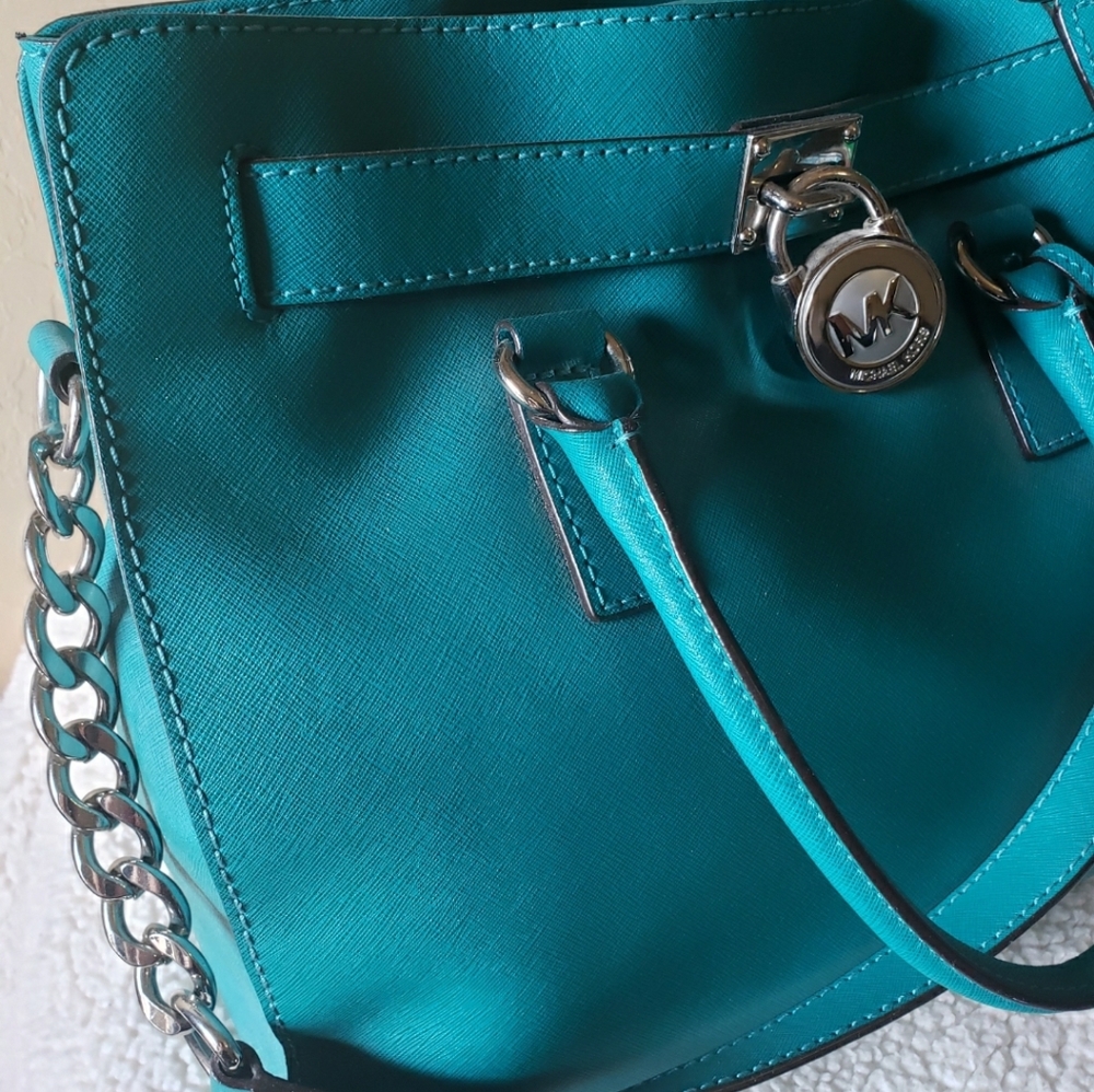 Michael Kors unique beautiful color like new bag.